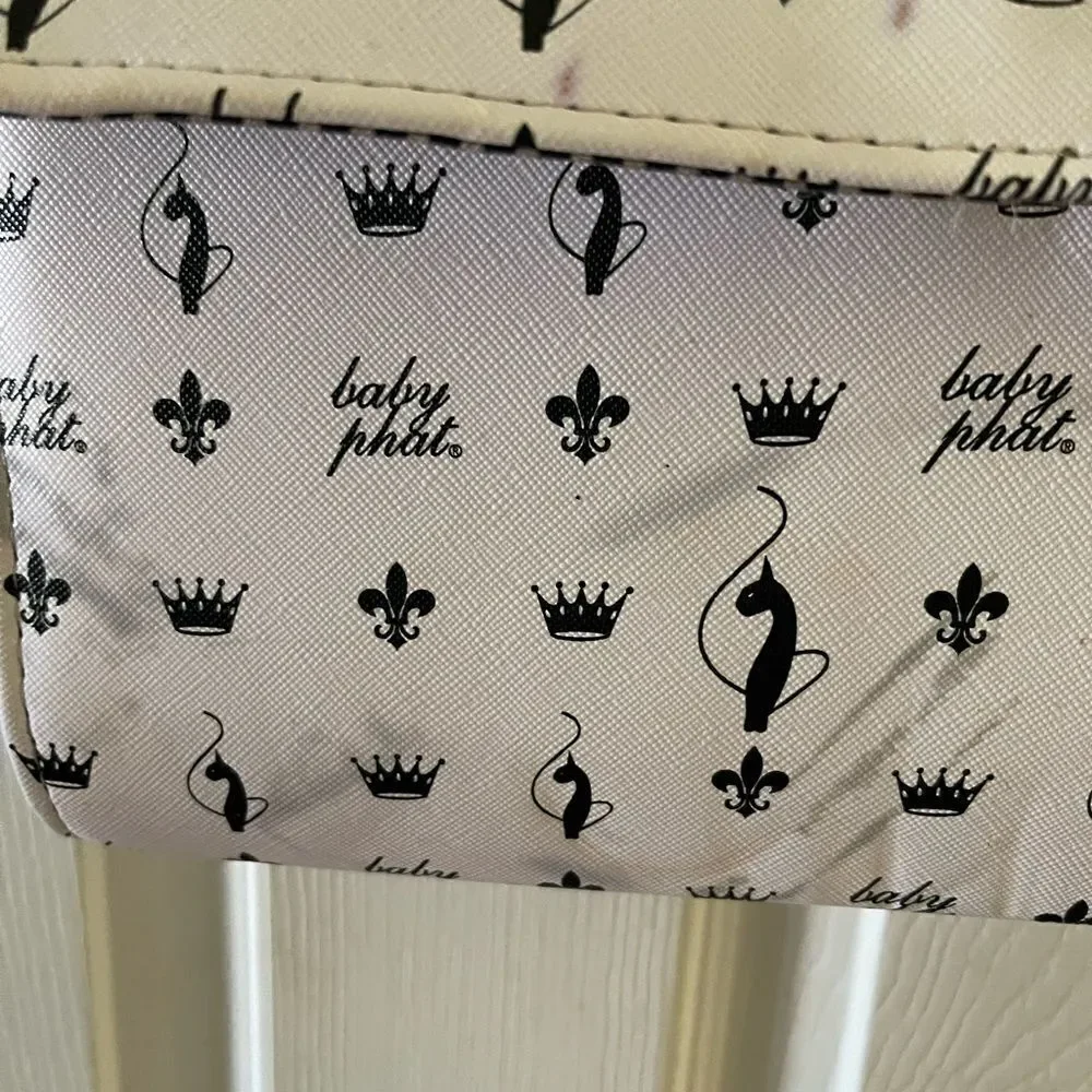 Baby Phat black and white logo satchel/shoulder bag with gold tone accent.